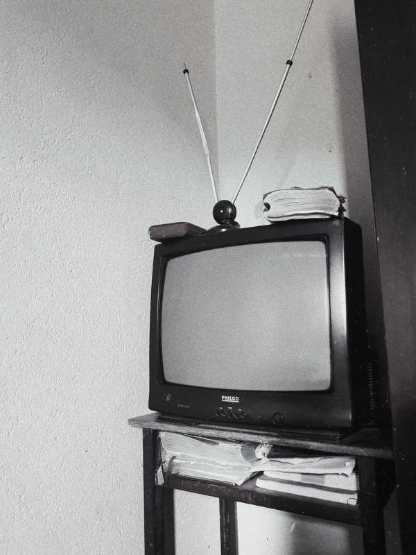 rabbit ear antenna atop tv